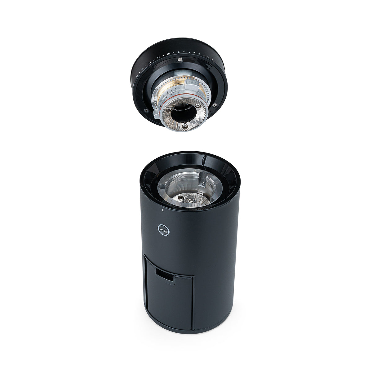 Wilfa Uniform Evo coffee grinder with the upper burr removed and held above the body, showing the stainless steel grinding burrs.