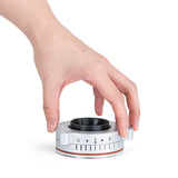 Two hands turning the grind adjustment ring of the Wilfa Uniform Evo coffee grinder, with markings from C (coarse) to F (fine).