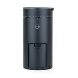 Wilfa Uniform Evo black coffee grinder, front view, showing the flat matte-black body and grounds container, on a white background.