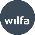 Wilfa logo: white lowercase 'wilfa' wordmark on a dark blue-gray circle.